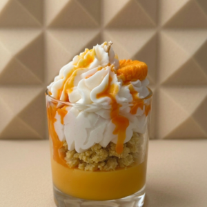 Indulge in our handmade Orange Creamsicle Dessert Candle! Featuring a realistic whipped wax top & citrus scent, it's the perfect aesthetic food candle gift.